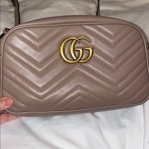 GG Marmont small leather matelassé shoulder bag.